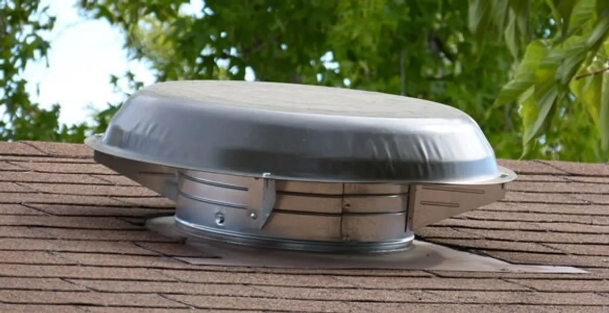 attic fan installation services with low-profile roof ventilation unit in Peoria, IL