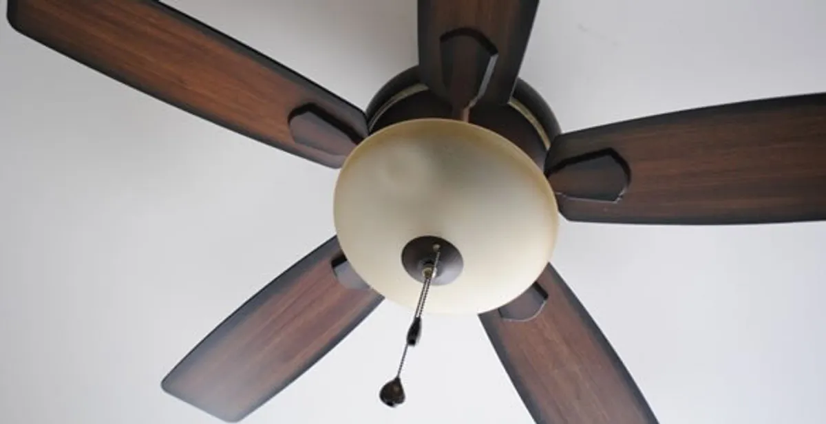 Fully installed ceiling fan with balanced blades and light fixture in Peoria, IL
