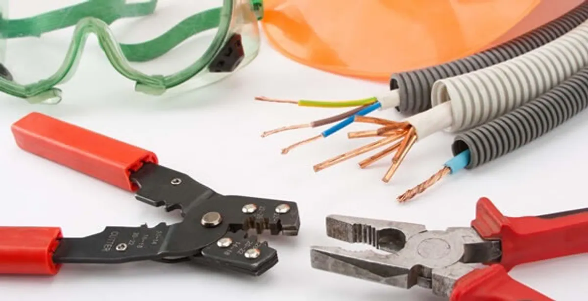 Electrical wiring repair with professional tools and safety equipment in Edwards, IL