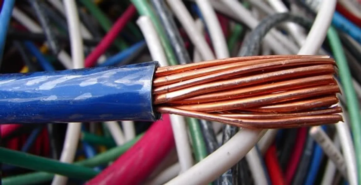 electrical wiring services showing exposed copper conductors and cable preparation in Peoria, IL