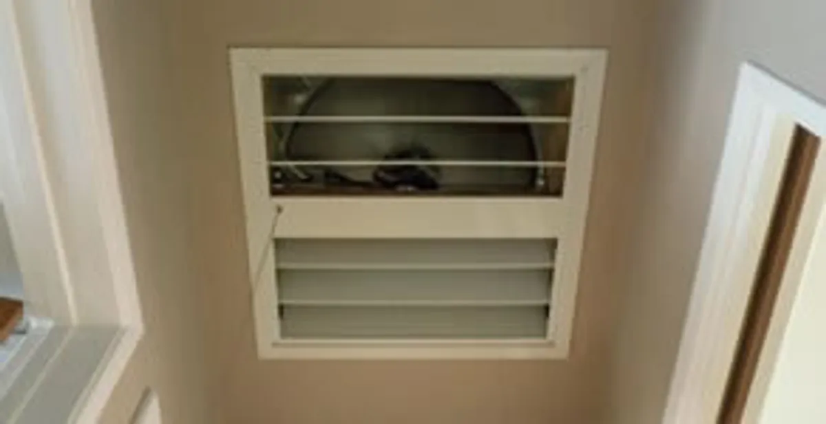 whole house fan installation services with ceiling-mounted ventilation system in Peoria, IL